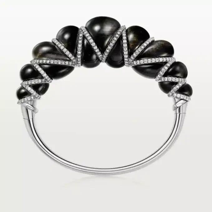 Cartier Libre Tressage-armbånd, obsidian, diamanter Cartier Libre Tressage-armbånd, obsidian, diamanter