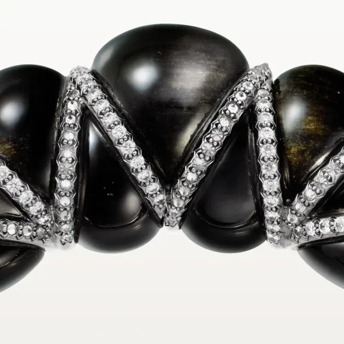 Cartier Libre Tressage-armbånd, obsidian, diamanter Cartier Libre Tressage-armbånd, obsidian, diamanter