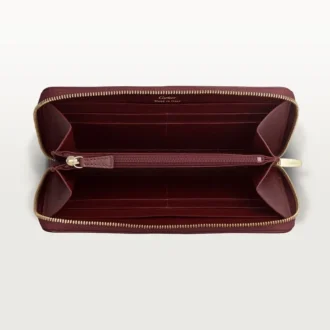 International tegnebog med lynlås, Must De Cartier – burgunderfarvet kalveskind, gylden finish – Cartier