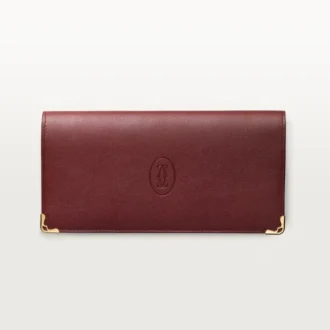 International tegnebog med udvidelsesfolder, Must De Cartier – burgunderfarvet kalveskind, guldfinish – Cartier