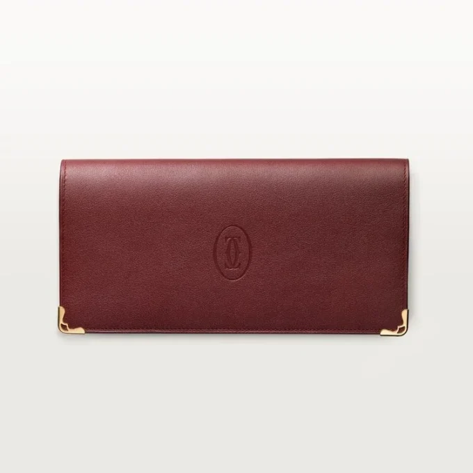 International tegnebog med udvidelsesfolder, Must De Cartier – burgunderfarvet kalveskind, guldfinish – Cartier International tegnebog med udvidelsesfolder, Must De Cartier – burgunderfarvet kalveskind, guldfinish – Cartier