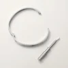 Love-armbånd, mellemstort model, 4 diamanter Love-armbånd, mellemstort model, 4 diamanter