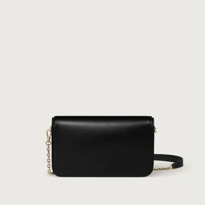 Mini-kædetaske, Double C De Cartier – sort kalveskind, guld og sort emaljefinish – Cartier Mini-kædetaske, Double C De Cartier – sort kalveskind, guld og sort emaljefinish – Cartier