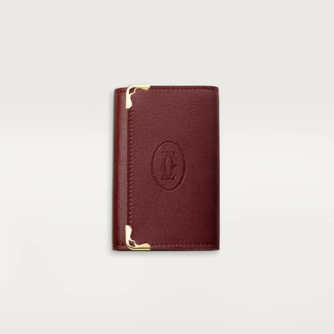 Nøglering med 6 nøgler, Must De Cartier – burgunderfarvet kalveskind, guldfarvet finish – Cartier Nøglering med 6 nøgler, Must De Cartier – burgunderfarvet kalveskind, guldfarvet finish – Cartier