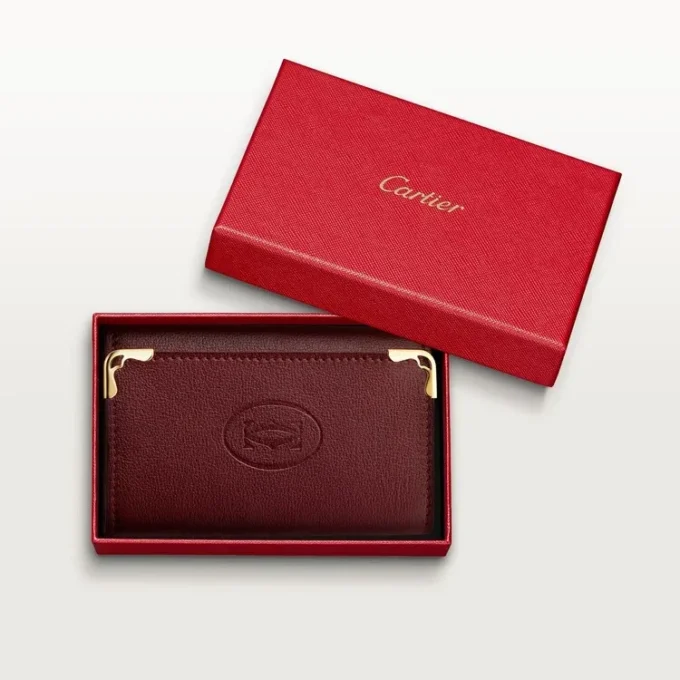 Nøglering med 6 nøgler, Must De Cartier – burgunderfarvet kalveskind, guldfarvet finish – Cartier Nøglering med 6 nøgler, Must De Cartier – burgunderfarvet kalveskind, guldfarvet finish – Cartier