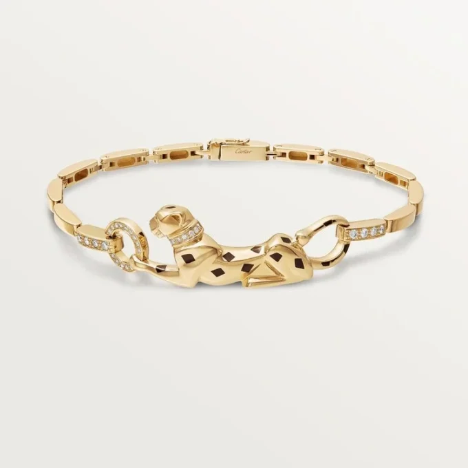 Panthere De Cartier armbånd – gult guld, lak, diamant, tsavorit-granat, onyx – Cartier Panthere De Cartier armbånd – gult guld, lak, diamant, tsavorit-granat, onyx – Cartier
