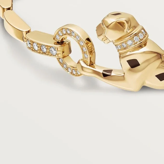 Panthere De Cartier armbånd – gult guld, lak, diamant, tsavorit-granat, onyx – Cartier Panthere De Cartier armbånd – gult guld, lak, diamant, tsavorit-granat, onyx – Cartier
