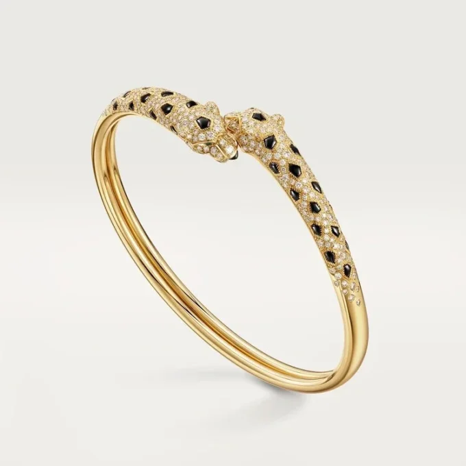 Panthere De Cartier armbånd, lille model, halvbelagt Panthere De Cartier armbånd, lille model, halvbelagt