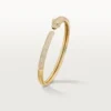 Panthere De Cartier armbånd, lille model, halvbelagt Panthere De Cartier armbånd, lille model, halvbelagt
