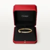 Panthere De Cartier armbånd, lille model, halvbelagt Panthere De Cartier armbånd, lille model, halvbelagt