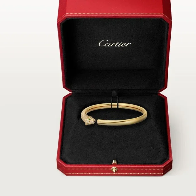 Panthere De Cartier armbånd, lille model, halvbelagt Panthere De Cartier armbånd, lille model, halvbelagt