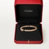 Panthere De Cartier armbånd, lille model, halvbelagt Panthere De Cartier armbånd, lille model, halvbelagt