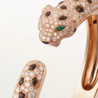 Panthere De Cartier armbånd, mellemstor model, halvt pavé