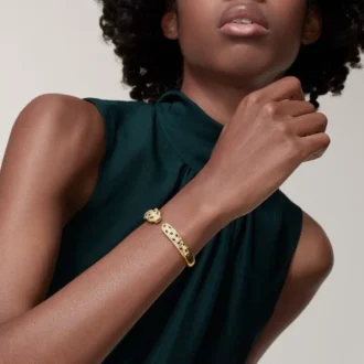 Panthere De Cartier armbånd, mellemstor model, halvt pavé