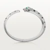 Panthere De Cartier armbånd, mellemstor model, halvt pavé Panthere De Cartier armbånd, mellemstor model, halvt pavé
