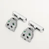 Panthere De Cartier manchetknapper – rhodineret hvidguld, diamanter, smaragder, onyx – Cartier Panthere De Cartier manchetknapper – rhodineret hvidguld, diamanter, smaragder, onyx – Cartier