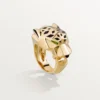 Panthere De Cartier-ring – Gult guld, lak, tsavorit-granat, onyx – Cartier Panthere De Cartier-ring – Gult guld, lak, tsavorit-granat, onyx – Cartier