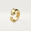 Panthere De Cartier-ring – gult guld, onyx, tsavorit-granat – Cartier Panthere De Cartier-ring – gult guld, onyx, tsavorit-granat – Cartier