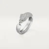 Panthere De Cartier-ring – hvidguld, smaragder, onyx, diamanter – Cartier Panthere De Cartier-ring – hvidguld, smaragder, onyx, diamanter – Cartier