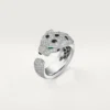 Panthere De Cartier-ring – hvidguld, smaragder, onyx, diamanter – Cartier Panthere De Cartier-ring – hvidguld, smaragder, onyx, diamanter – Cartier