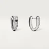 Panthere Diamond små hoopøreringe, hvidguld | Cartier Us Panthere Diamond små hoopøreringe, hvidguld | Cartier Us