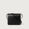Skuldertaske, Mini, Double C De Cartier – Sort kalveskind, guld og sort emaljefinish – Cartier Skuldertaske, Mini, Double C De Cartier – Sort kalveskind, guld og sort emaljefinish – Cartier