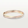 Trinity-armbånd i tricolor-guld, klassisk model | Cartier Us Trinity-armbånd i tricolor-guld, klassisk model | Cartier Us