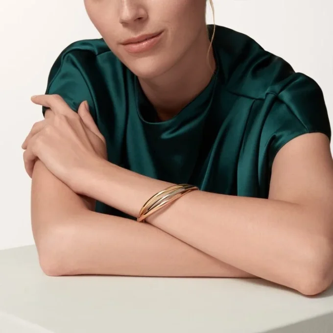 Trinity-armbånd i tricolor-guld, klassisk model | Cartier Us Trinity-armbånd i tricolor-guld, klassisk model | Cartier Us