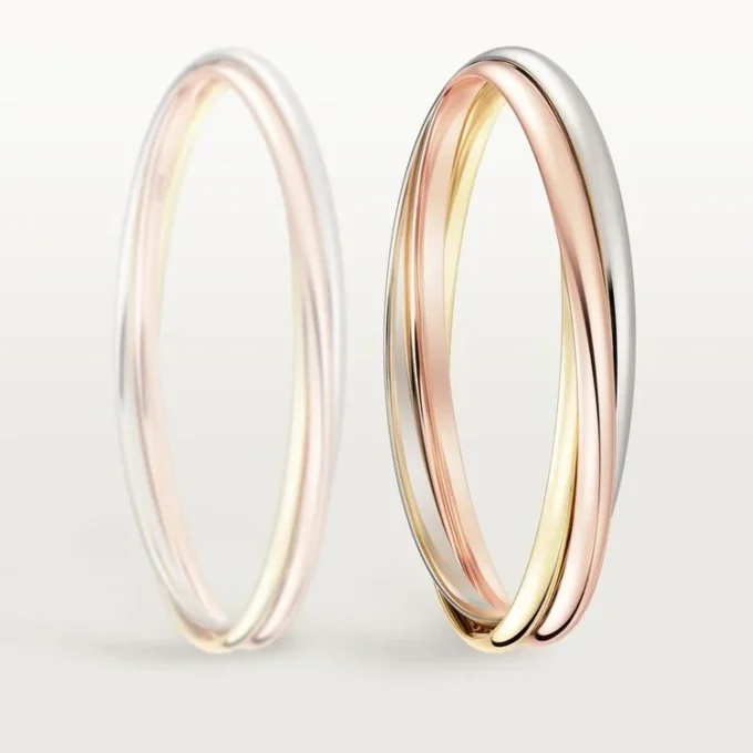 Trinity-armbånd i tricolor-guld, klassisk model | Cartier Us Trinity-armbånd i tricolor-guld, klassisk model | Cartier Us