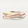 Trinity-ring i tricolor-guld, klassisk model | Cartier Us Trinity-ring i tricolor-guld, klassisk model | Cartier Us