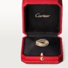 Trinity-ring i tricolor-guld, klassisk model | Cartier Us Trinity-ring i tricolor-guld, klassisk model | Cartier Us