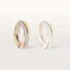 Trinity-ring, lille model, halvpavé Trinity-ring, lille model, halvpavé